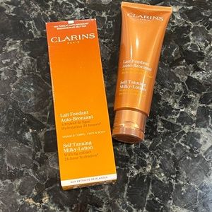 CLARINS- new in box and sealed. Self tanner tanning milky lotion bronzer…